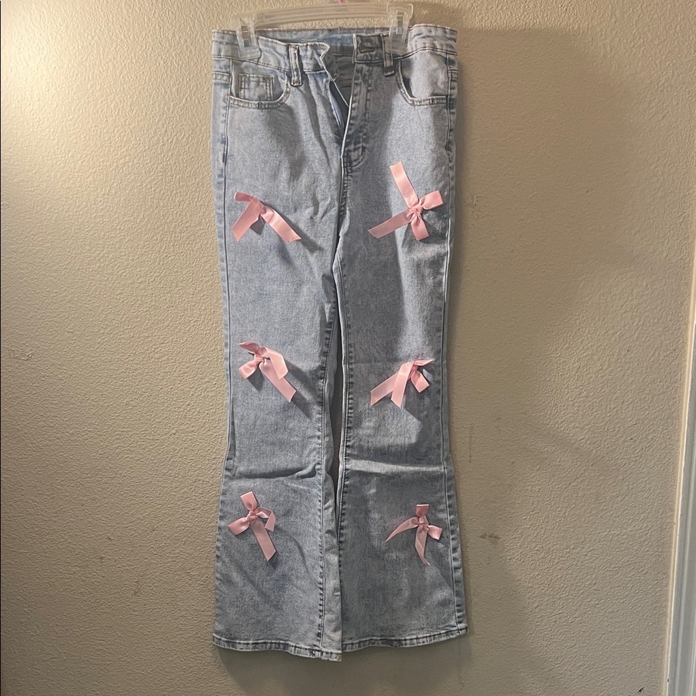 SHEIN Light Blue Jeans with Pink Bow Accents